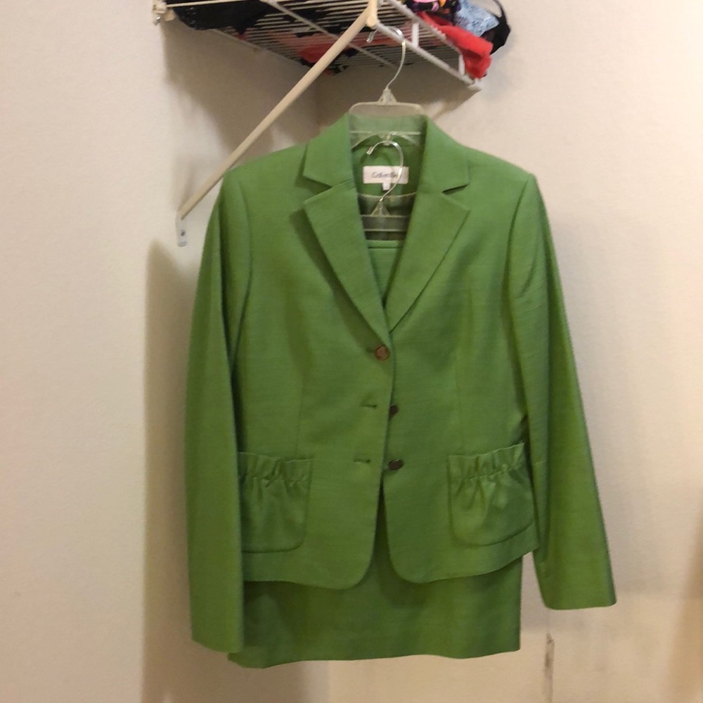 Women suits blazer and skirt. Size 6